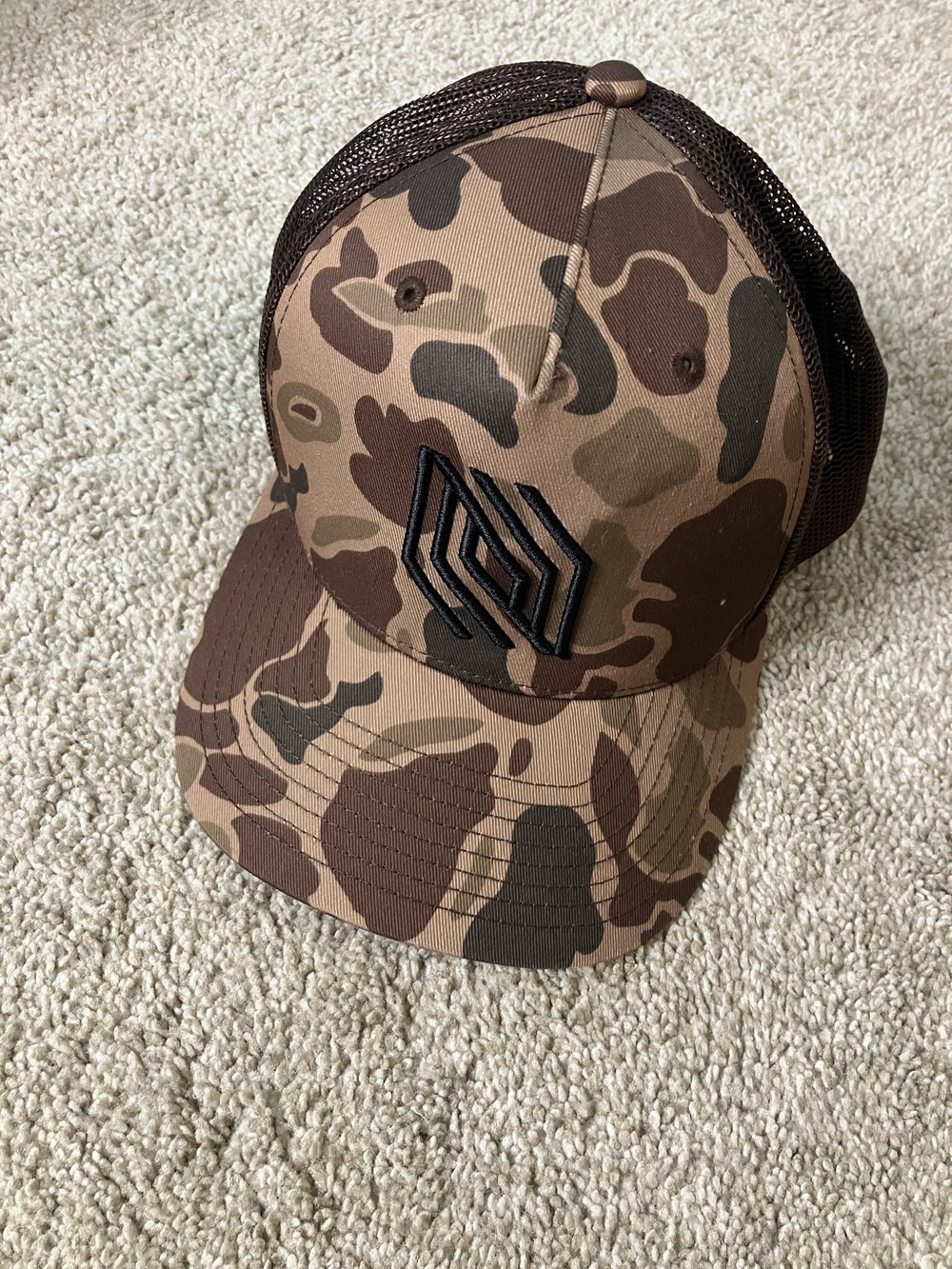 Richardson Camo Trucker Hat with Black Patch Logo